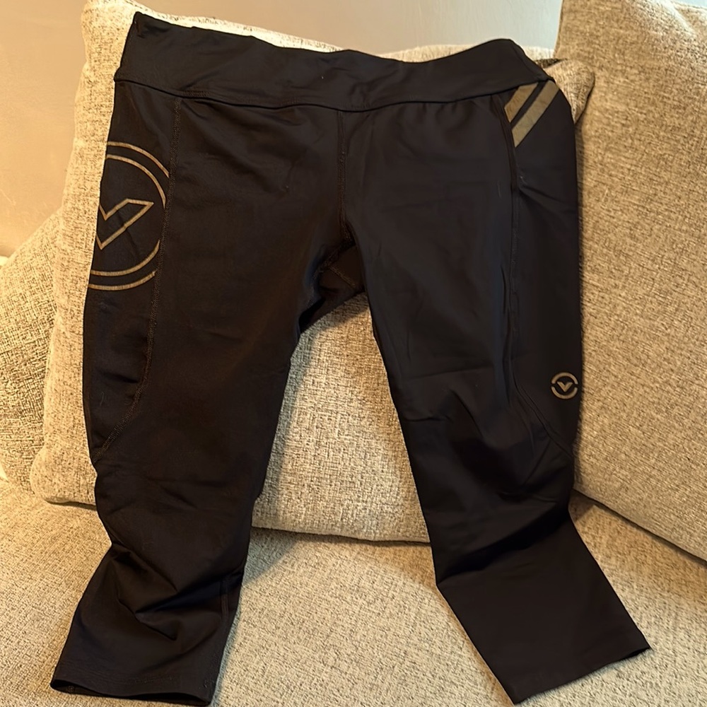 Virus workout leggings. Black Xl with gold accents.